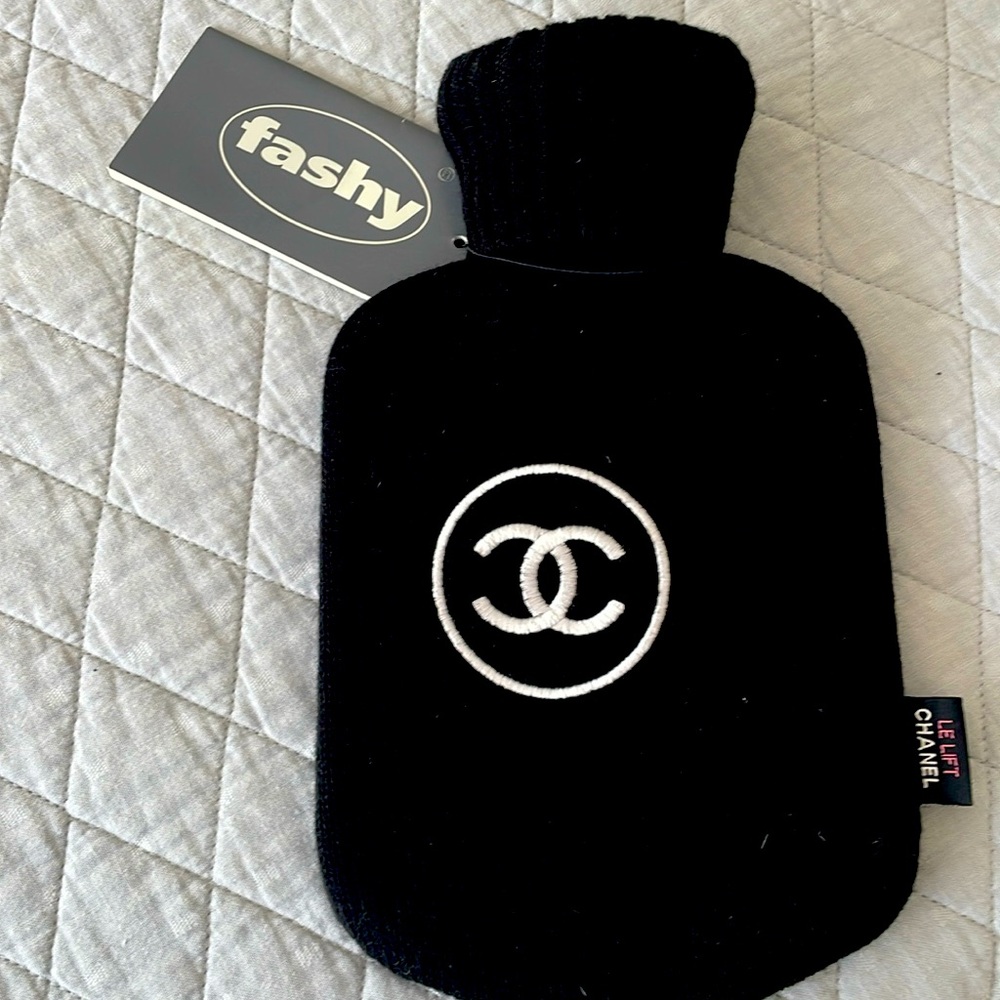 Fashy Design Covered Hot Water pouch (NEW)
With tag never used.

CHANEL LOGO
